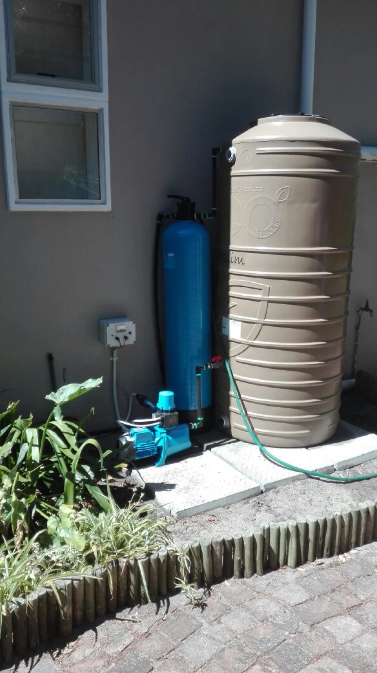 A complete domestic system on a suburban plot.